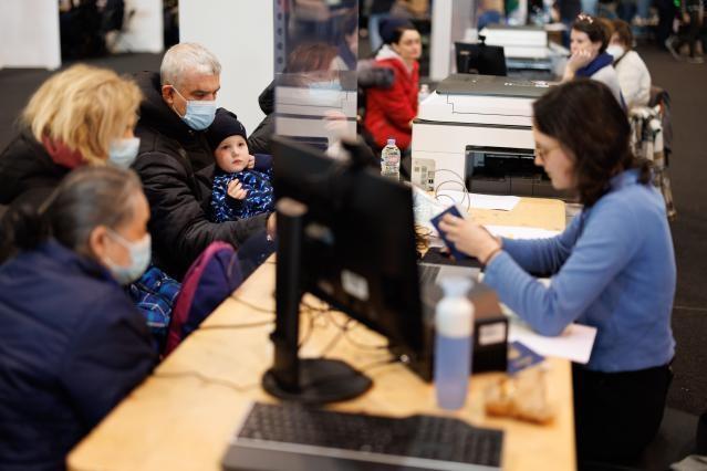 Refugees from Ukraine during their registration process for temporary protection in Brussels