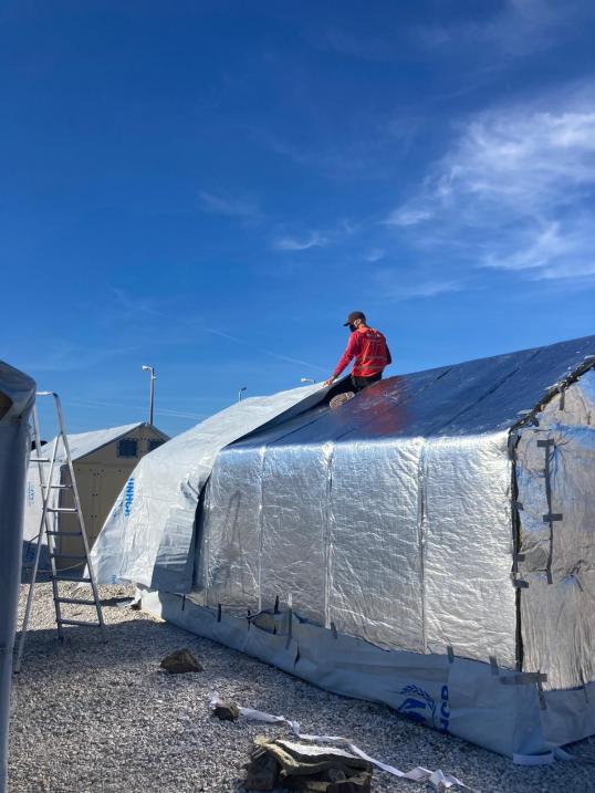 Insulating Refugee Housing Units against cold in the temporary centre on Lesvos, December 2021