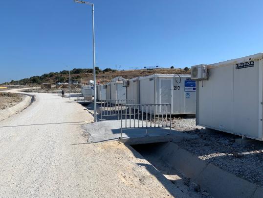 Accommodation containers that replaced tents in the temporary centre on Lesvos, December 2021