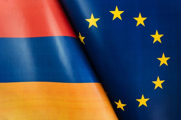 The image shows the Armenian and the EU flags, side by side.